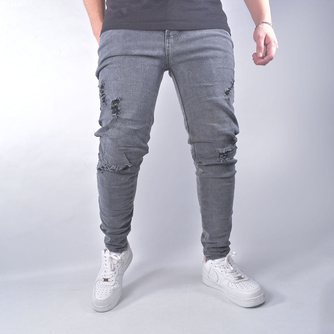 Jean skinny gris con desgaste para hombre