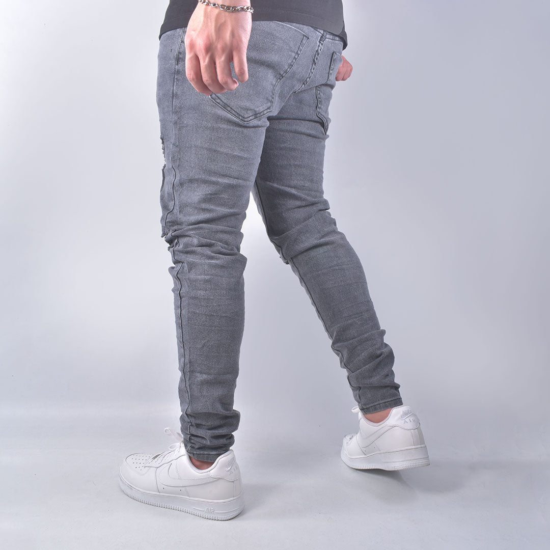 Jean skinny gris con desgaste para hombre